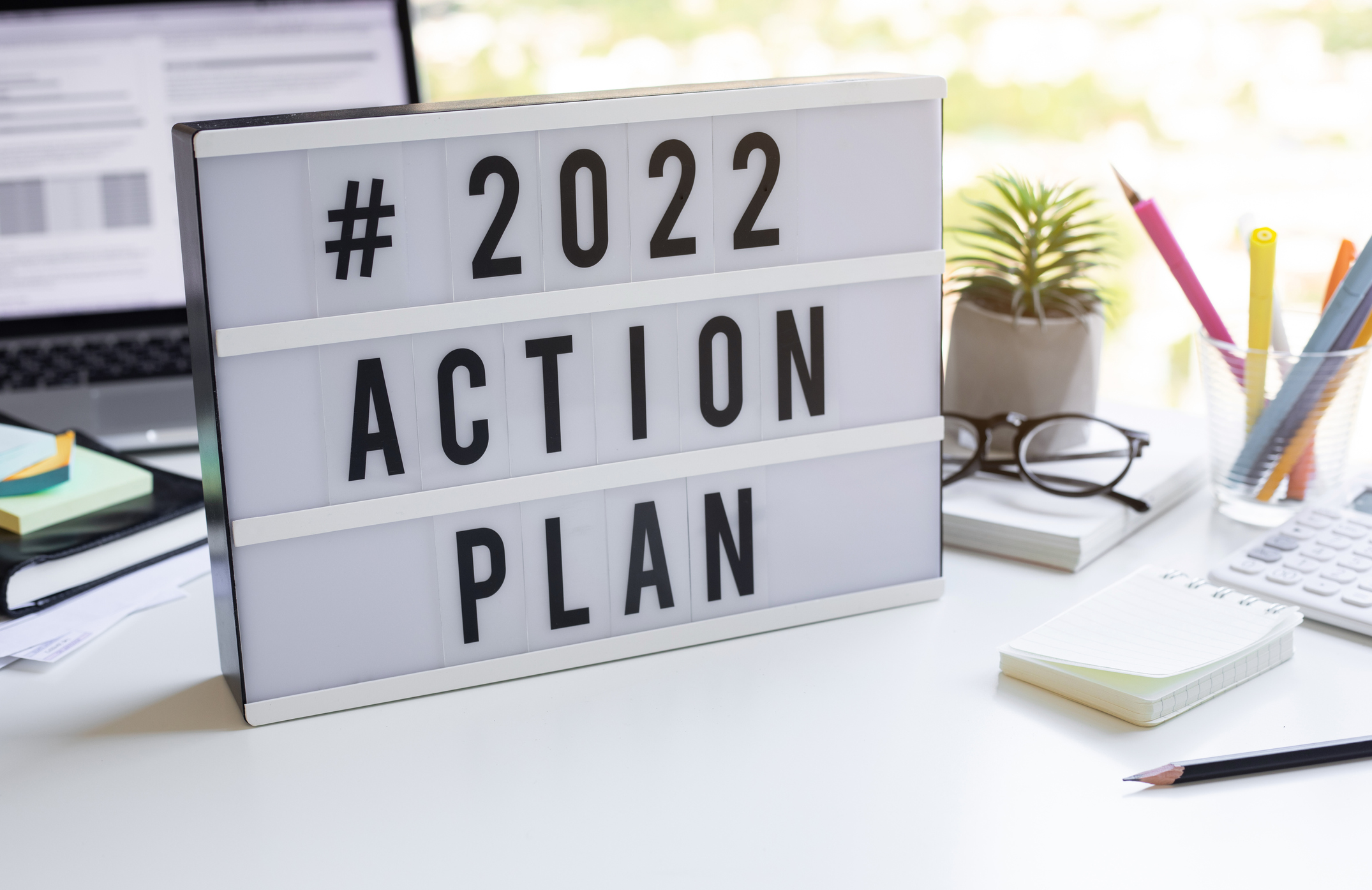 2022 action plan text on light box on desk table in office 2022 action plan text on light box on desk table in office
