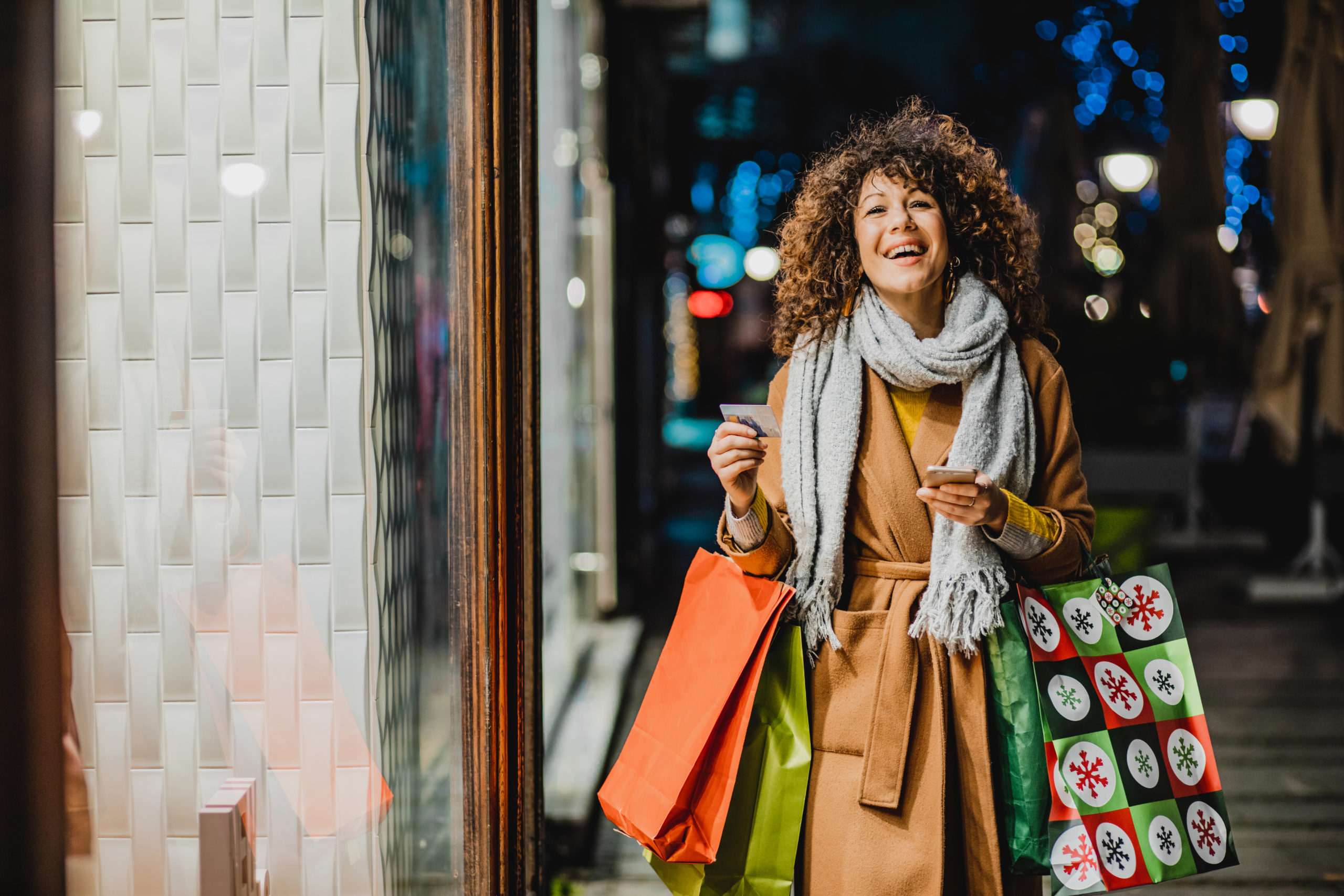 Young woman shopping for Christmas